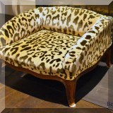 F81. Leopard print dog bed. 